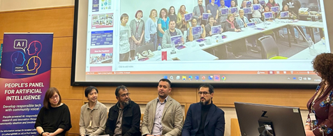 The panelists for the Peope's Panel for AI review event, seated in a row. Behind them is a slide reading "Meet the panelists"