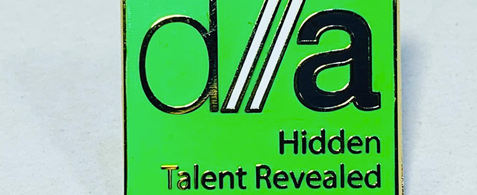 The Digital Advantage Logo on a pin badge, with the text reading "Hidden Talent Revealed"